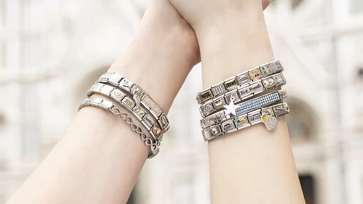 Unveiling The Beauty Of Nomination Charms: A Timeless Jewellery Trend